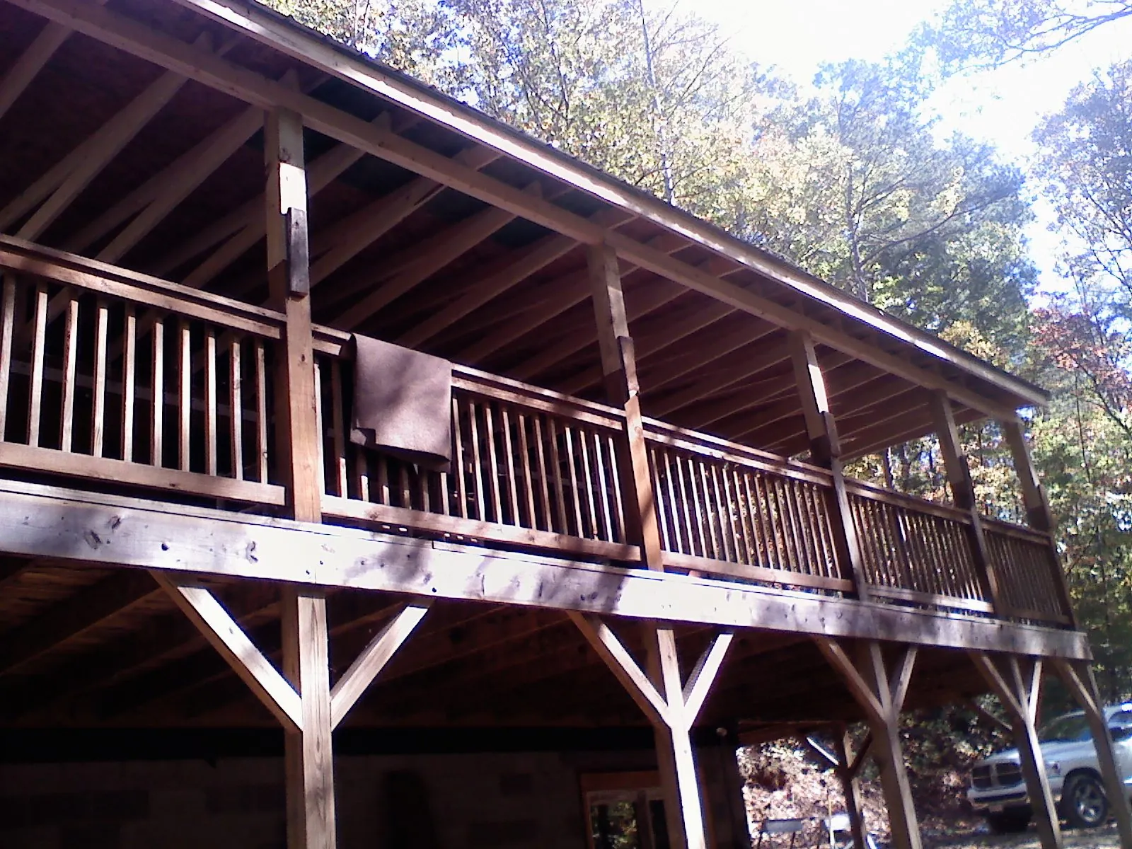 Timber framing under a new elevated porch and deck — Roof Leak Repair in Indiahoma by Roofing Brothers